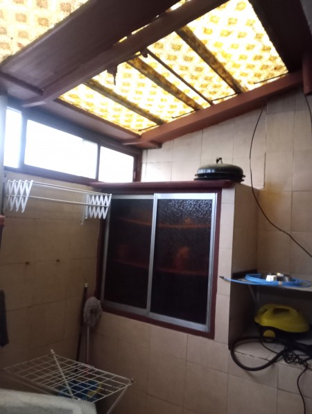 Patio con el lavadero
